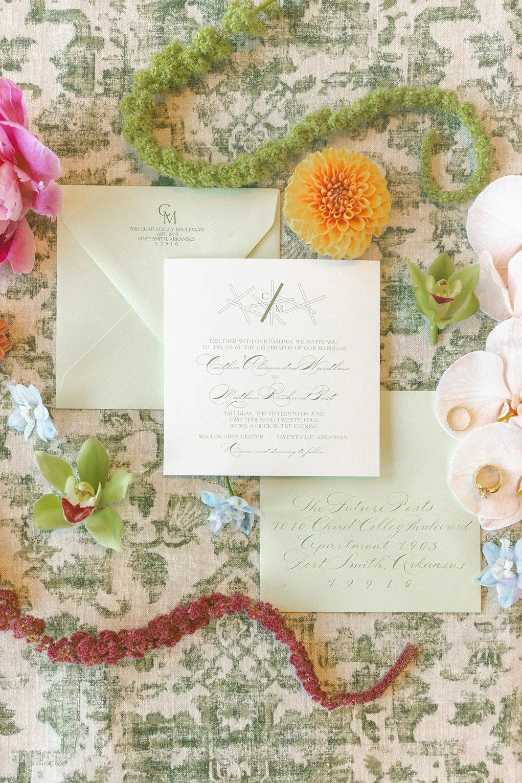 Invitation card with envelope on a decorative floral and patterned background